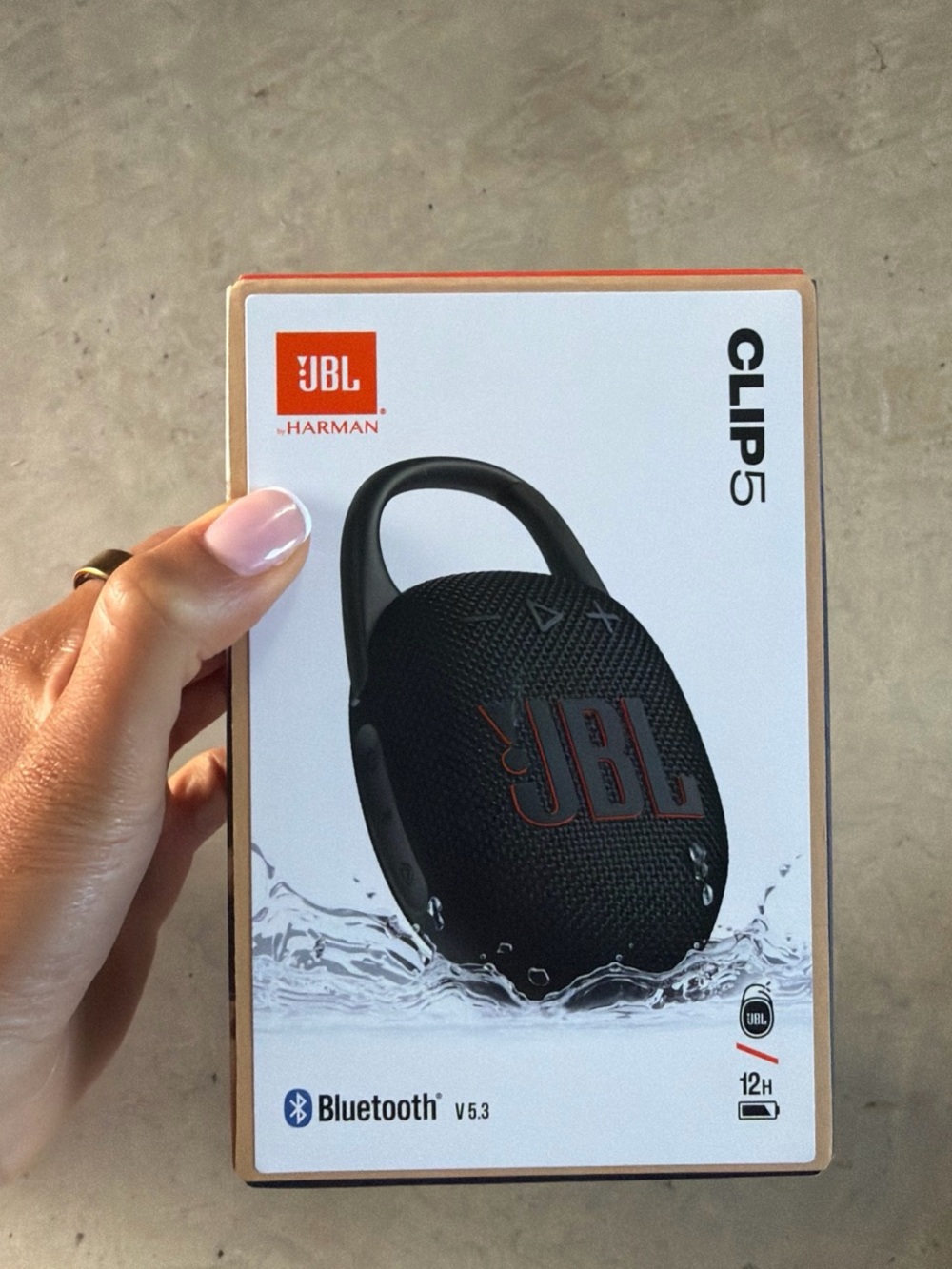 JBL Black Clip-Style Portable Bluetooth Speaker with Red Accent